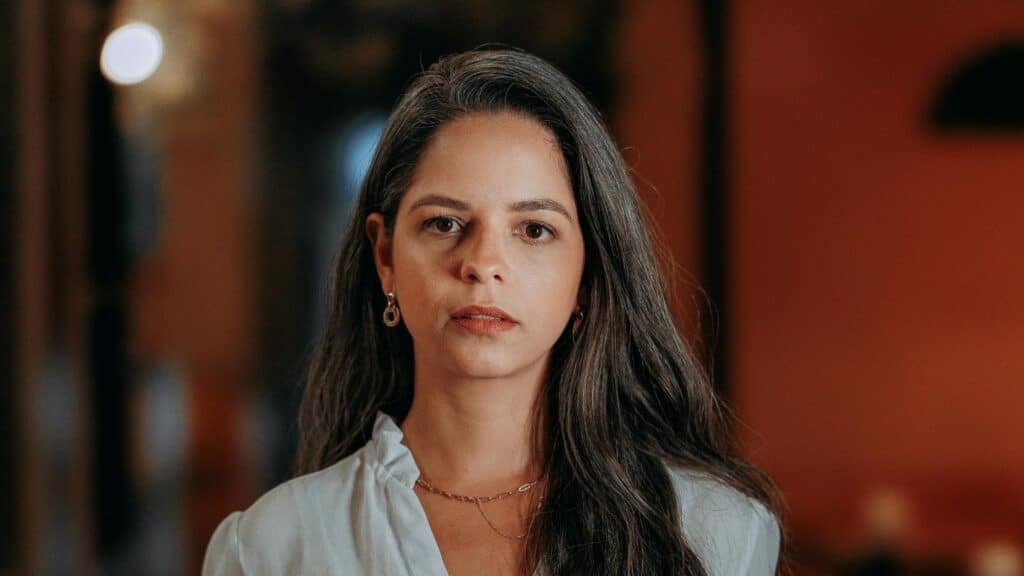 A woman in higher ed leadership burdened; Dr Kim Burns Higher Ed Coach and Consultant