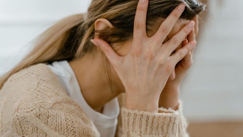 woman with Imposter syndrome in higher education; Dr Kim burns Consultant for women in higher ed leadership